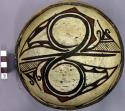 Bowl, polacca polychrome style c. int: Zuni rain bird design; ext: slipped, no d