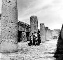 Children amongst a group of the columns at Mitla