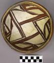 Bowl, polacca polychrome style c. int: linear design; ext: slipped, no design