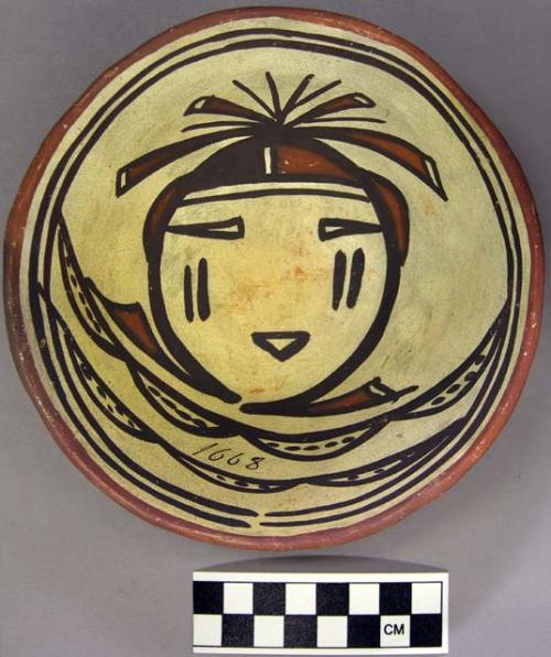 Bowl, polacca polychrome style c. int: kachina design; ext: slipped, no design.