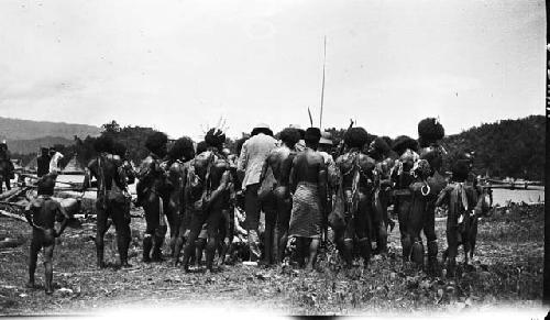 Rear view of group of men