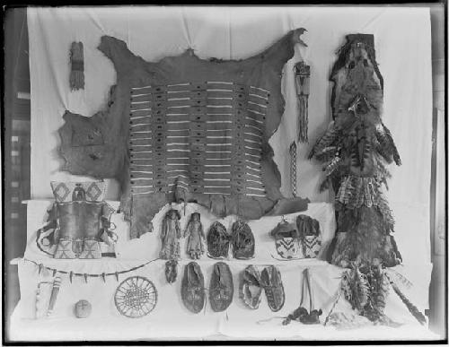 Buffalo robe, wolf robe, moccasins and other objects