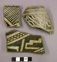 Ceramic sherds, rim sherds, black and white painted designs