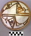 Bowl, polacca polychrome style c. int: linear design; ext: slipped, no design