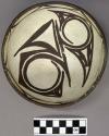 Bowl, polacca polychrome style c. int: linear design; ext: zuni rain bird design