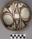 Bowl, polacca polychrome style c. int: zuni rain bird design; ext: linear design