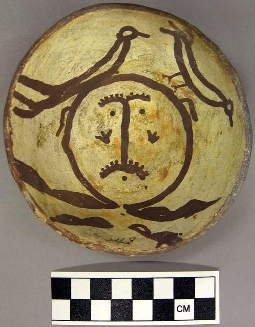 Bowl, polacca polychrome style c. int: clown design; ext: slipped, no design. 3.