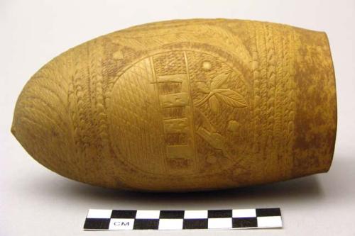 Incised gourd vessel with metal stand