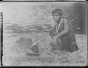 Boy boiling a pot