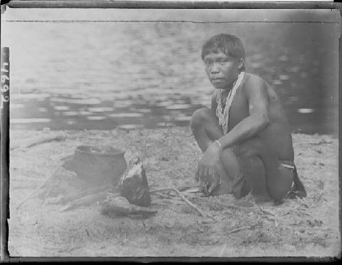 Boy boiling a pot