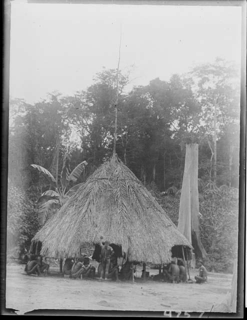 People in front of house