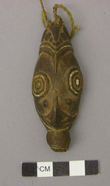 Small carved wooden mask