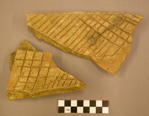 Sherd, pottery, thick, inscribed with cross-hatching inside