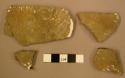 Ceramic body sherds, incised, mended, redware