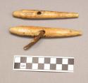 2 harpoon shafts of wood with ivory sockets