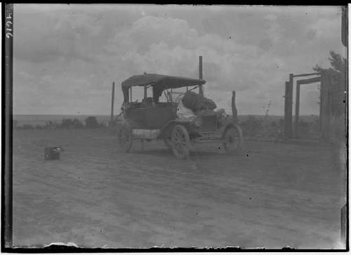 Automobile with outfit of C.C. Willoughby and R.G. Fuller on way to Chin Lee