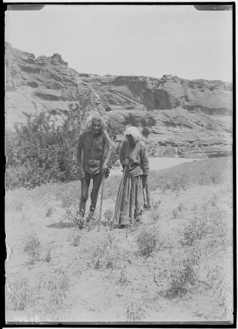 Navajo man and woman taken at camp of C.C. Willoughby and R.G. Fuller