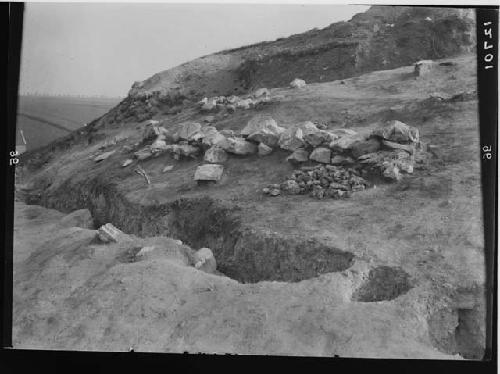 House complex C - stones back of west palisade, below pit 48