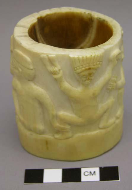 Carved ivory box, human figures