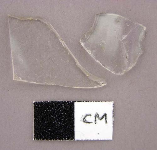 Glass, fragment, clear, slightly curved