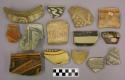 Ceramic sherds, various rim and body sherds, painted designs, one mended