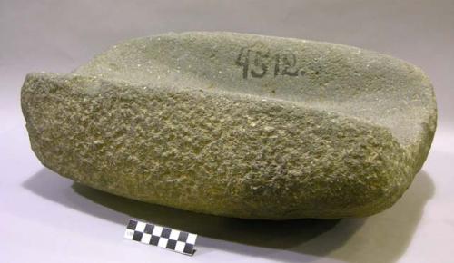 Metate. rectangular. deep, open-ended trough metate. rounded bottom & sides