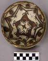 Bowl, polacca polychrome style c. int: plant design; ext: slipped, no design. 6.