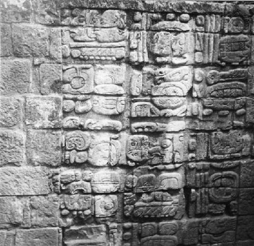 Glyphic panel, South jamb of East doorway, Temple II