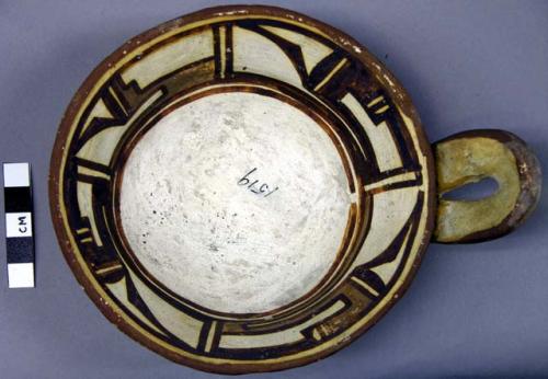 Ladle, polacca polychrome style c. int: linear design; ext: slipped, no design.