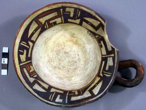 Ladle, polacca polychrome style c. int: linear design; ext: slipped, no design.