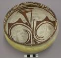 Bowl, polacca polychrome style c. int: zuni rain bird design; ext: slipped, no d