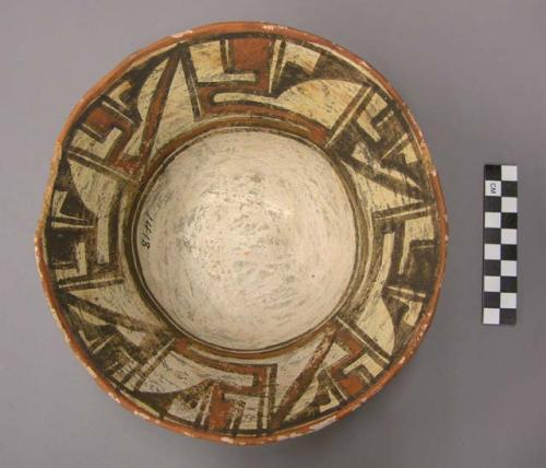 Bowl, polacca polychrome style c. int: linear design; ext: slipped, no design. 9