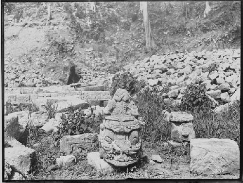 Sculptured head near stela M