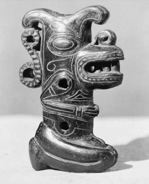 Anthropomorphic pottery whistle