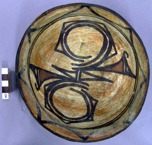 Bowl, polacca polychrome style c. int: Zuni rain bird design; ext: slipped, no d