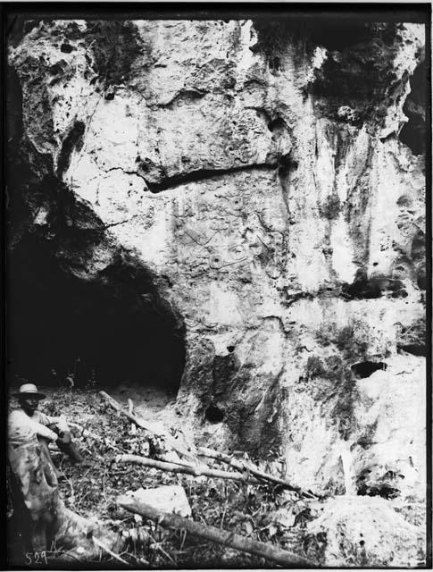 Sculpted figure at entrance to cave