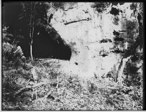 Sculpted figure at entrance to cave