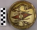 Bowl, polacca polychrome style c. int: zuni rain bird design; ext: slipped, no d