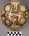 Bowl, polacca polychrome style c. int: zuni rain bird design; ext: slipped, no d