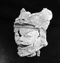 Str. H12, incensario head (human face, jaguar headdress), found in front of alta