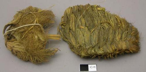 Fiber bundles, each plaited onto a frame; some secured after excavation with whi