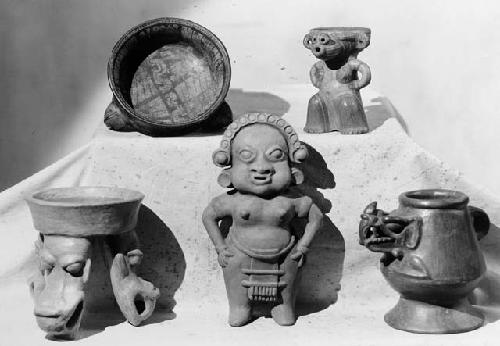 Pottery figurines and vessels