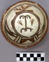 Bowl, polacca polychrome style c. int: clown design; ext: slipped, no design. 5.