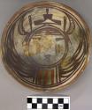 Bowl, polacca polychrome style c. int: kachina design; ext: slipped, no design.