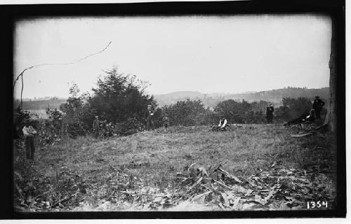 Tail, before work on park -- showing several men