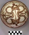 Bowl, polacca polychrome style c. int: zuni rain bird design; ext: slipped, no d