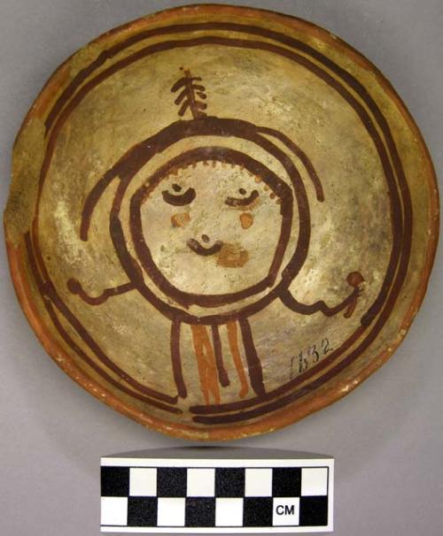 Bowl, polacca polychrome style c. int: clown design; ext: slipped, no design. 3.