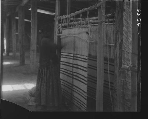 Woman making textile