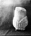 Fragment of mushroom stone with bird carved on stem