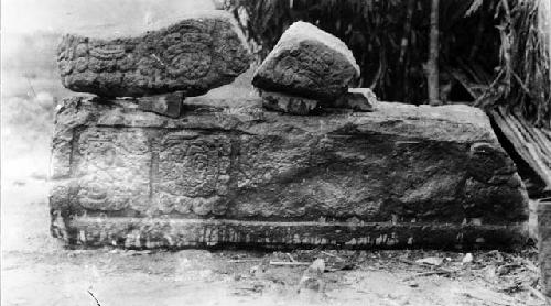 Side of Stela 19 with day of I.S. terminal date and associated altar above